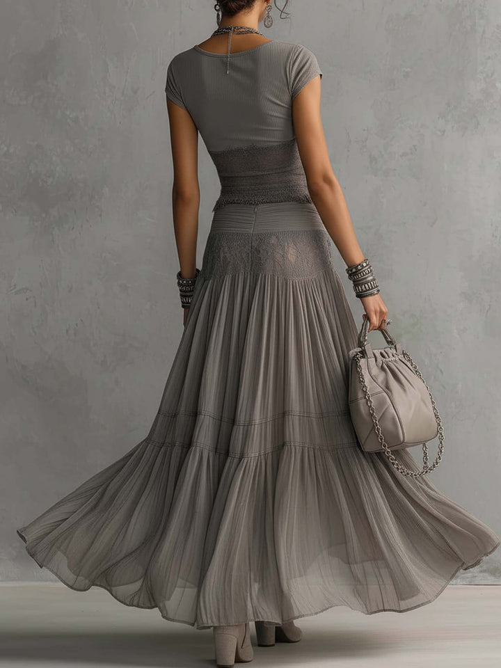 Olimpia | Completo Grigio con Top in Pizzo Trasparente e Gonna Maxi Plissé