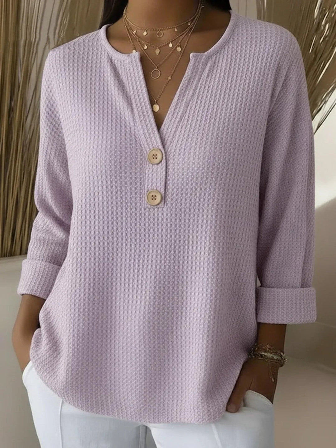 Elena | T-shirt Henley a Righe con Bottoni" can be rewritten as:

"Elena | T-shirt Henley Striped with Buttons